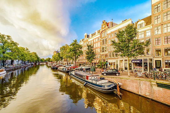 Coach hire prices and minibus with driver prices for one day trip in Amsterdam, Netherlands